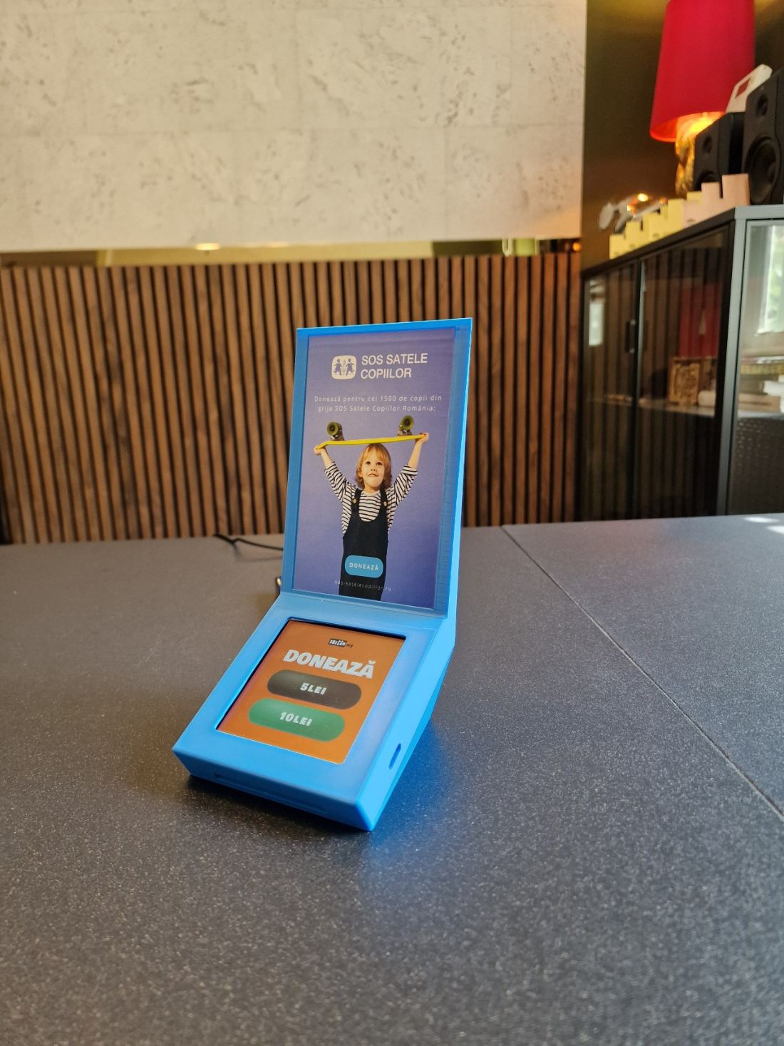 A blue box, with a campaign message on the vertical panel