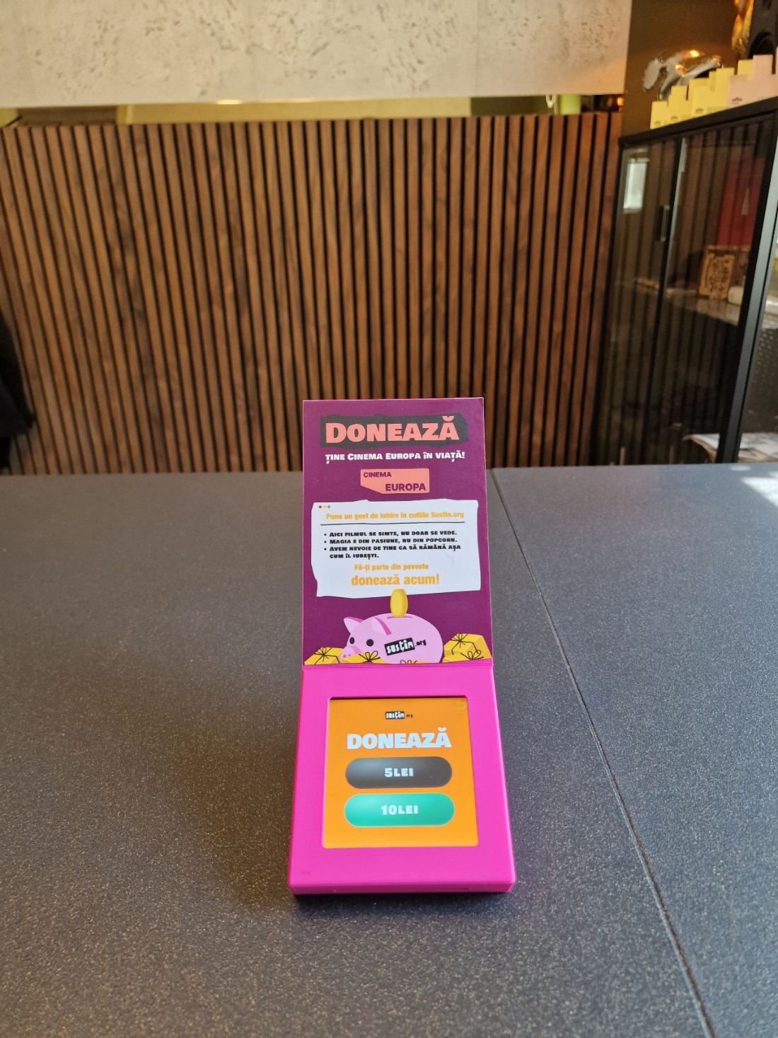 Front view of the pink box and its campaign message
