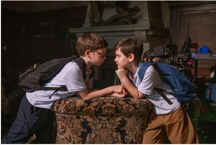 Two of the children, face to face on the film’s set
